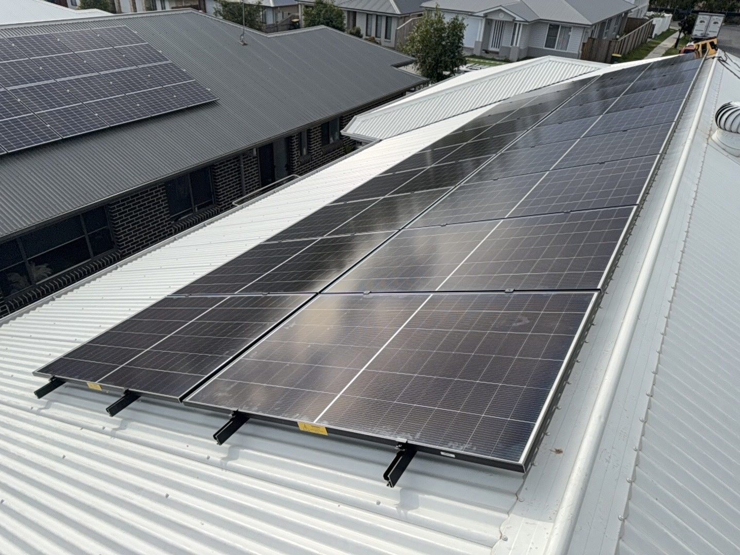 Rooftop solar panel installation on a residential roof